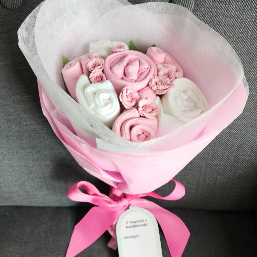 A Sweet Pink Buttercup Baby Clothes Bouquet